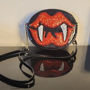 Glittery Red and Black Vampire Design Crossbody Bag Betsey Johnson